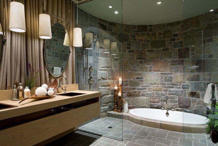 10-ad-opulent-bathroom-with-a-sunken-jacuzzi-and-a-curved-stone-wall-718x479