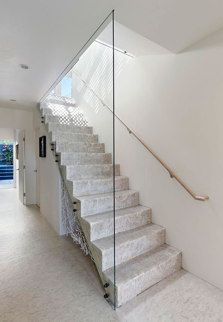 Minimal-modern-staircase-connects-teh-various-levels-of-revamped-San-Francisco-home