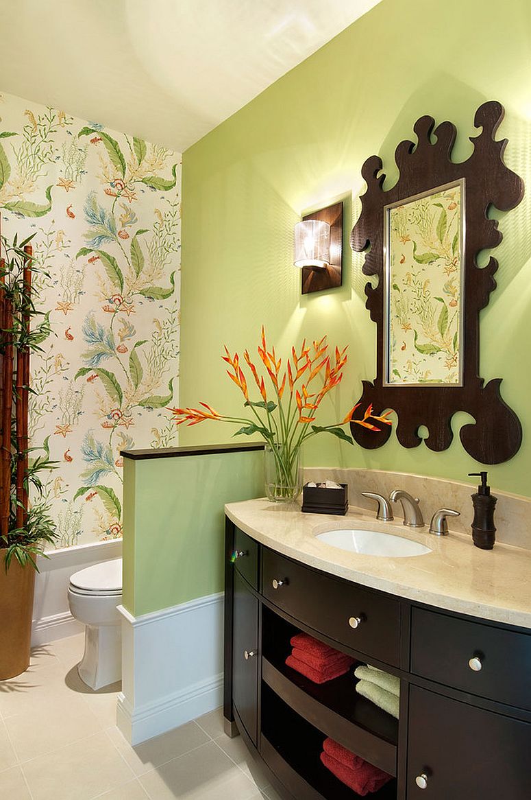 Mirror-frame-seems-to-complement-the-pattern-of-Thibaut-wallpaper-in-the-powder-room