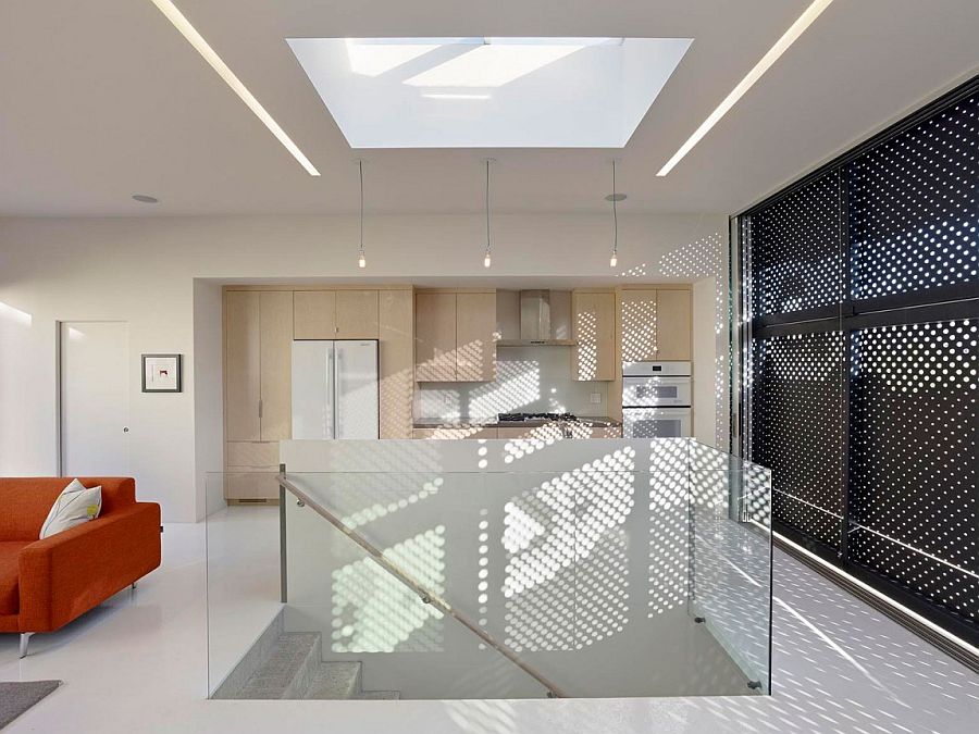 Skylight-above-the-staircase-brings-natural-light-to-even-the-lower-levels-of-the-house