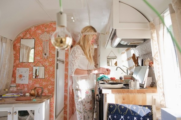 Sarah-at-work-in-the-kitchen-of-her-Airstream-600x399