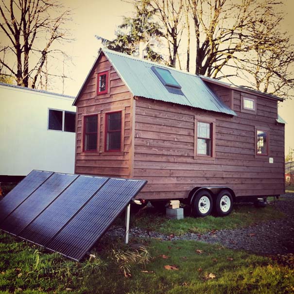 Malissa and Christopher Tack live in a perfect miniature home in Snohomish, Washington, which they built themselves taking a little over seven months. The couple have named their cottage-on-wheels The Tiny Tack House, a 140 sq. ft. wooden structure which is complete with living room, kitchen, bathroom and a sleeping loft. They had very little knowledge of how to build a house when they took on the project in order to 'downsize' 'The work was done by Chris and myself. There was a few days where the parents flew in to help out with the roof", said Malissa. 'We had advice help with the electrical and plumbing from a certified person'. 'Just about everyone we know thought we were crazy, but now, everyone loves the idea of the house!' The house has four solar panels and is supplied by a 40 gallon fresh water tank, making it environmentally, as well as financially, friendly. Pictured: Tiny House Ref: SPL480656 180113 Picture by: Splash News Splash News and Pictures Los Angeles: 310-821-2666 New York: 212-619-2666 London: 870-934-2666 photodesk@splashnews.com 